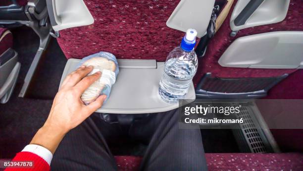 man sitting and eating sandwich on bus - the dublin airport stock pictures, royalty-free photos & images