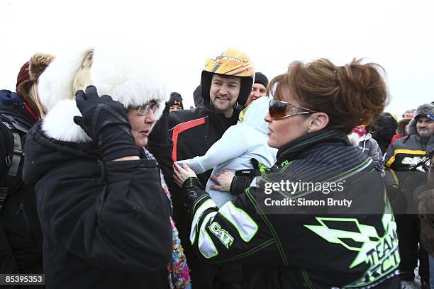 Iron Dog: Team Todd Palin with wife, Alaska Governor Sarah Palin and son Trig before start of Pro Class race at Big Lake. Wasilla, AK 2/8/2009...