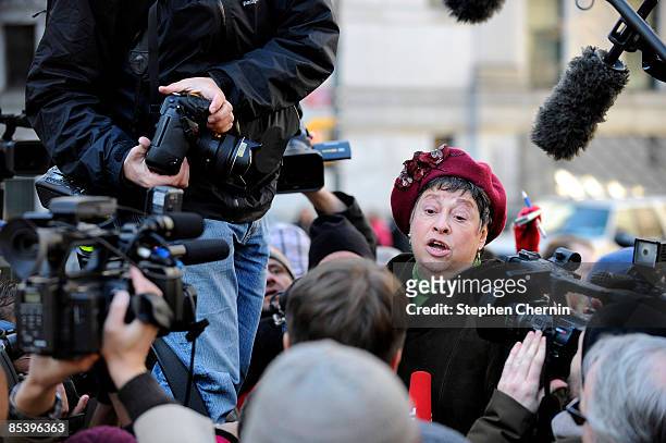 Defrauded investor Judith Welling speaks to the media outside of a Manhattan Federal court after disgraced financier Bernard Madoff was sent by a...