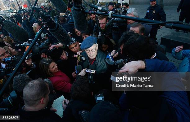 Victim Stuart Baker , who had invested with financier Bernard Madoff, is interviewed outside a Manhattan Federal courthouse after Madoff was sent by...