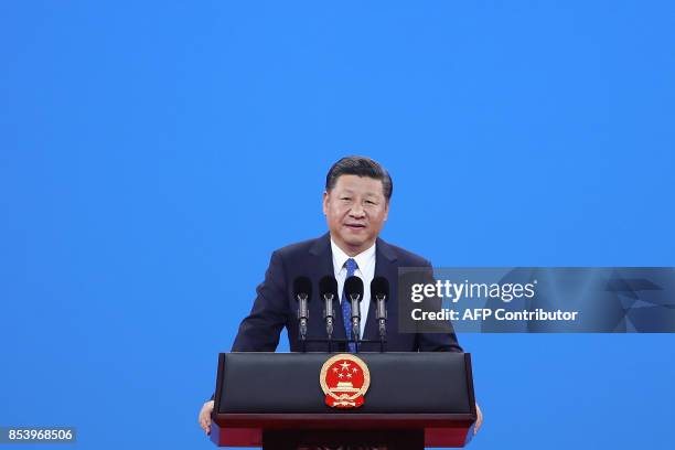 China's President Xi Jinping speaks during the 86th Interpol General Assembly at the Beijing National Convention Center in Beijing on September 26,...