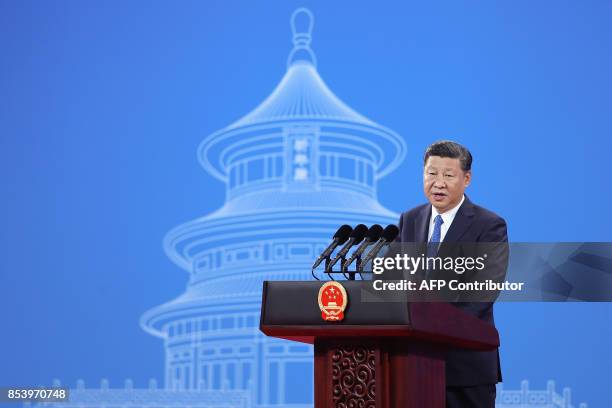 China's President Xi Jinping speaks during the 86th Interpol General Assembly at the Beijing National Convention Center in Beijing on September 26,...