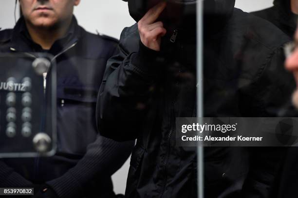 Boban S. Arrives for the first day of his trial on terror charges at the Oberlandesgericht Celle courthouse on September 26, 2017 in Celle, Germany....