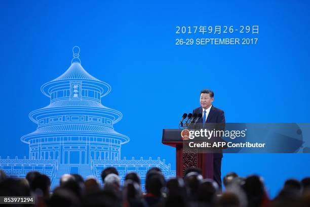 China's President Xi Jinping speaks during the 86th Interpol General Assembly at the Beijing National Convention Center in Beijing on September 26,...