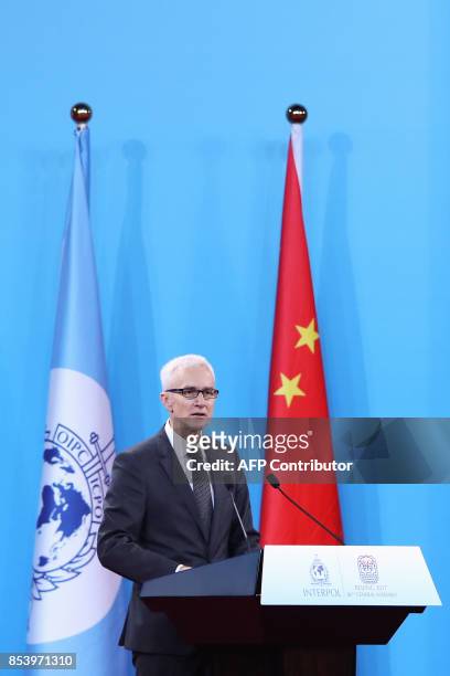 Interpol Secretary General Jurgen Stock speaks during the 86th Interpol General Assembly at the Beijing National Convention Center in Beijing on...
