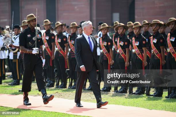 Defence Secretary Jim Mattis attends a guard of honour ceremony at the Indian Ministry of Defence prior to a meeting with Indian Defence Minister...