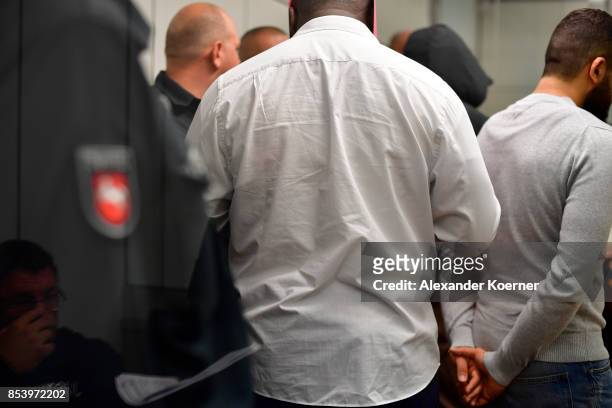 Ahmed F.Y. Arrives for the first day of his trial on terror charges at the Oberlandesgericht Celle courthouse on September 26, 2017 in Celle,...