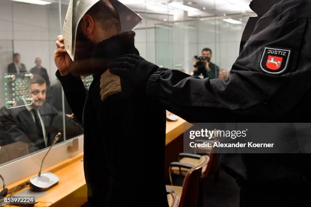 Ahmad Abdulaziz Abdullah A., also known as "Abu Walaa" arrives for the first day of his trial on terror charges at the Oberlandesgericht Celle...