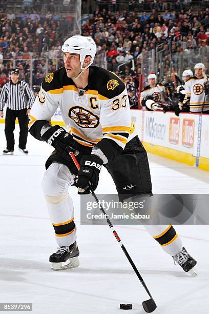 Defenseman Zdeno Chara of the Boston Bruins skates with the puck against the Columbus Blue Jackets on March 10, 2009 at Nationwide Arena in Columbus,...