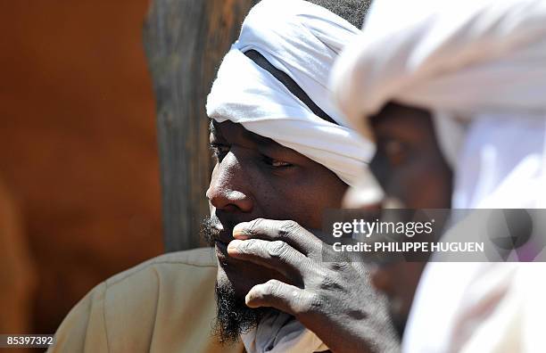 Sudanese refugees sit in the Ouré Cassoni camp in eastern Chad on March 12, 2009. The European Union will keep more than 2,000 peacekeepers in Chad...