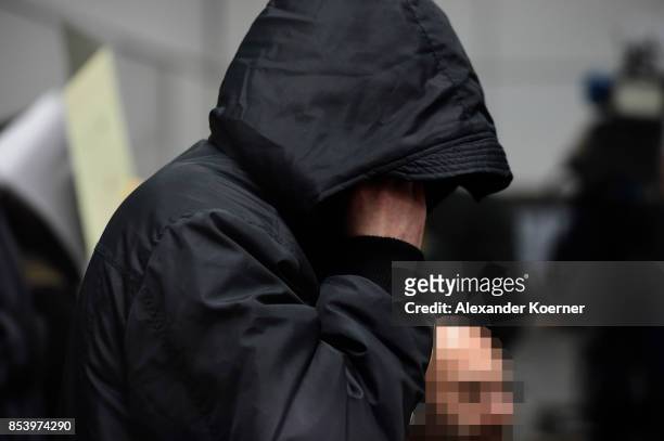 Boban S. Arrives for the first day of his trial on terror charges at the Oberlandesgericht Celle courthouse on September 26, 2017 in Celle, Germany....