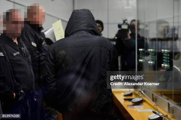 Boban S. Arrives for the first day of his trial on terror charges at the Oberlandesgericht Celle courthouse on September 26, 2017 in Celle, Germany....