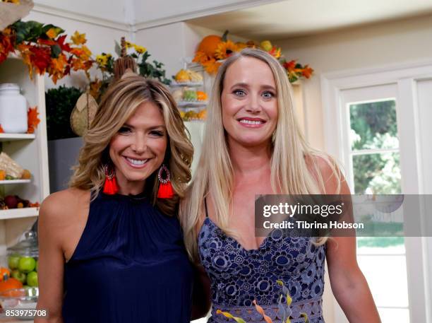 Debbie Matenopoulos and Linda Miller Nicholson pose for a photo on the set of Hallmark's 'Home and Family' at Universal Studios Hollywood on...