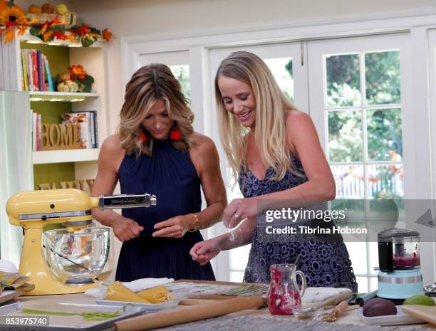 Debbie Matenopoulos and Linda Miller Nicholson talk on the set of Hallmark's 'Home and Family' at Universal Studios Hollywood on September 25, 2017...