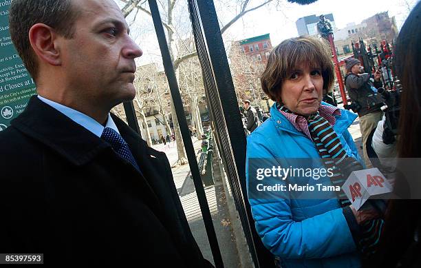 Spokes person Ilene Kent , who had invested with financier Bernard Madoff, is interviewed with her lawyer outside a Manhattan Federal courthouse...