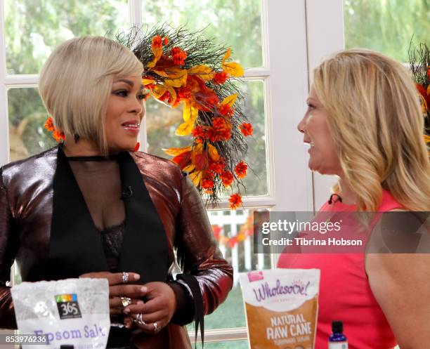 Boz and Kym Douglas talk on the set of Hallmark's 'Home and Family' at Universal Studios Hollywood on September 25, 2017 in Universal City,...