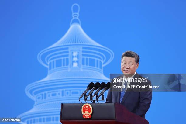 China's President Xi Jinping speaks during the 86th Interpol General Assembly at the Beijing National Convention Center in Beijing on September 26,...