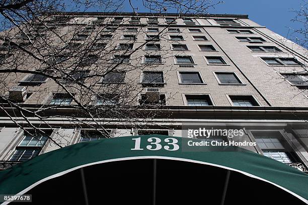 Tree hovers over the apartment building where the financier Bernard Madoff lived and also stayed under house arrest until a judge sent him to jail to...
