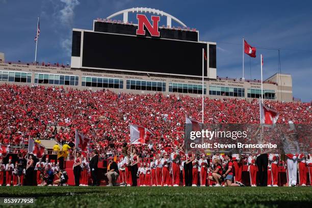 The band of the Nebraska Cornhuskers awaits the arrival of the team before the game against the Rutgers Scarlet Knights at Memorial Stadium on...