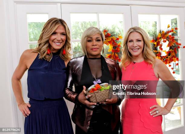 Debbie Matenopoulos, T-Boz and Kym Douglas pose for a photo on the set of Hallmark's 'Home and Family' at Universal Studios Hollywood on September...