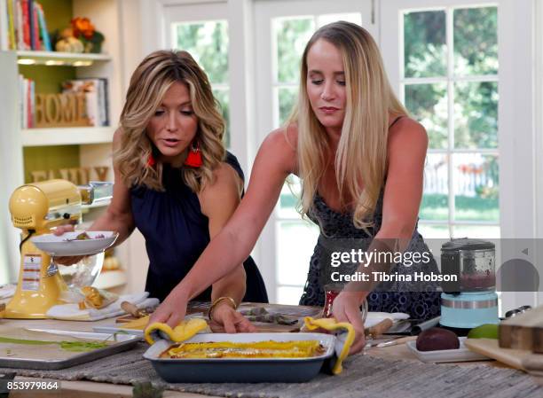 Debbie Matenopoulos and Linda Miller Nicholson talk on the set of Hallmark's 'Home and Family' at Universal Studios Hollywood on September 25, 2017...