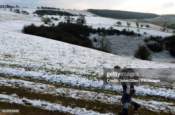 Snow on the high ground of the Yorkshire Wolds at Millington Pastures, near Pocklington, gives a walker a taste of the winter weather and snow that...