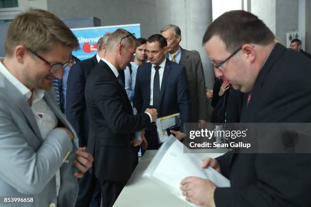 New members of the Bundestag faction of the right-wing Alternative for Germany arrive to receive documents and amenities from Bundestag workers prior...