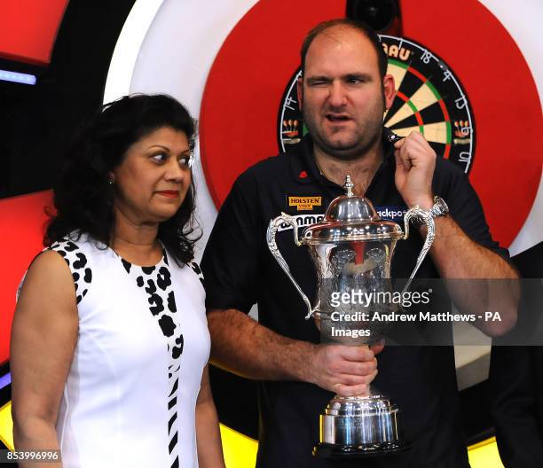 England's Scott Waites celebrates with Barbara Leitch after winning the BDO World Professional Darts Championships at the Lakeside Complex, Surrey.