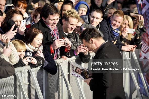 Anthony McPartlin signs autographs as he arrives at the Welsh auditions for the ITV programme Britain's Got Talent at the Millenniumm Centre, Cardiff.