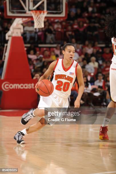 Kristi Toliver of the Maryland Terrapins handles the ball against the Rutgers Scarlet Knights at the Comcast Center on February 15, 2009 in College...