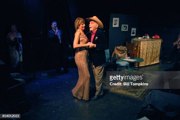 September 25: Jake LaMotta, the Raging Bull and his seventh wife Denise Baker dance during a performance of the Off Broadway play LADY AND THE CHAMP...