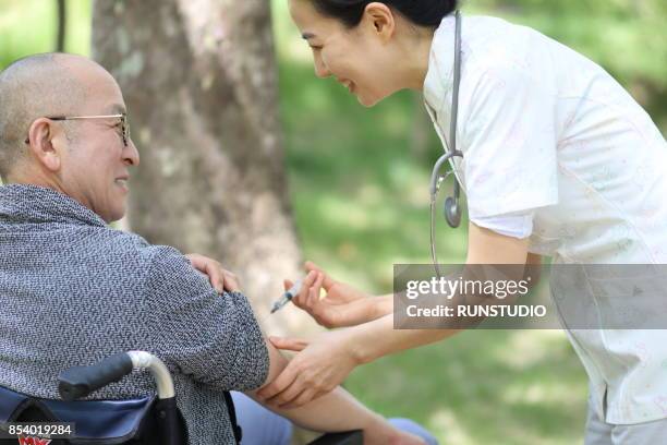 Giving Tree Injections 338 Tree Injections Stock Photos, High-Res Pictures, and Images - Getty ...