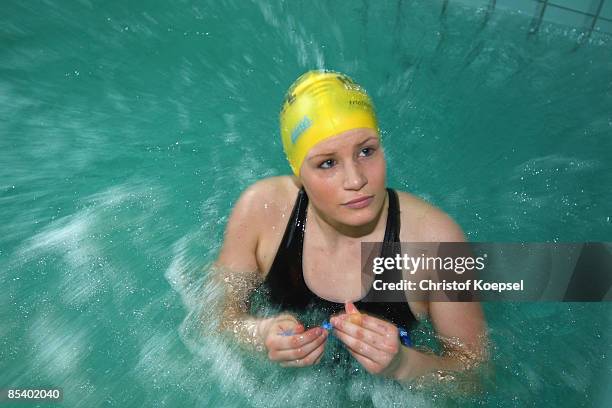 Carolin Nordkamp of PV Triathlon Witten prepares for swimming against a counter-current system during a sports performance diagnostic of triathletes...