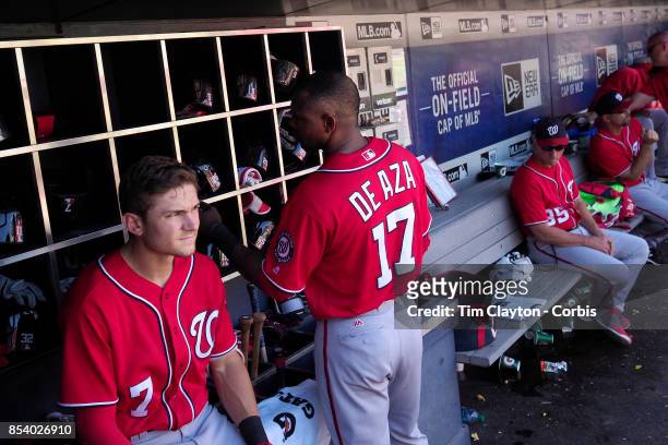 Trea Turner of the Washington Nationals and Alejandro De Aza of the Washington Nationals in the dugout preparing to bat during the Washington...