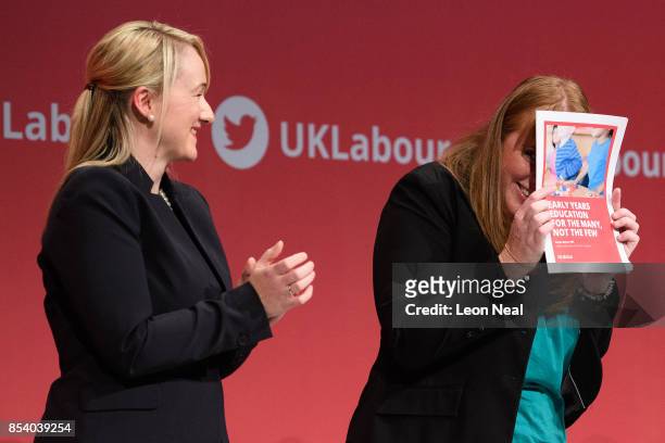 Shadow Secretary of State for Education Angela Raynor hides from applause behind the policy document that she had just launched in her speech on the...