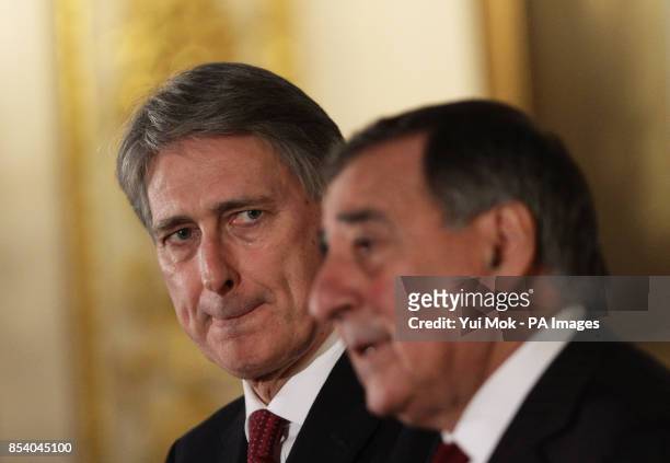 Defence Secretary Philip Hammond with US Secretary of Defence Leon Panetta during a press conference on the hostage crisis in Algeria at Lancaster...