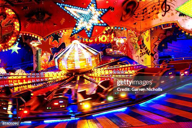 waltzing pyrotechnics - traveling carnival stock pictures, royalty-free photos & images