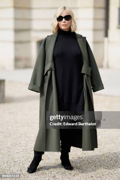 Emmanuelle Beart attends the Christian Dior show as part of the Paris Fashion Week Womenswear Spring/Summer 2018 on September 26, 2017 in Paris,...