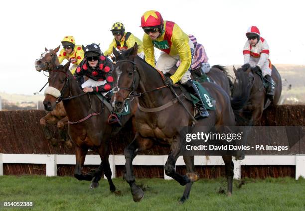 Shooters Wood ridden by jockey Ruby Walsh leads the field during The Jenny Mould Memorial Handicap Chace