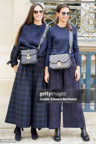 Viola Arrivabene and Vera Arrivabene attend the Christian Dior show as part of the Paris Fashion Week Womenswear Spring/Summer 2018 on September 26,...