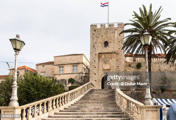 the famous staircase in korcula old town in croatia - fortress gate and staircases stock pictures, royalty-free photos & images
