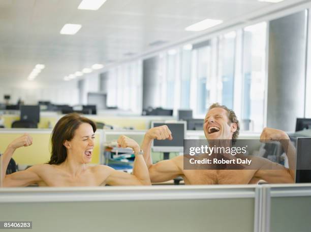 naked businesspeople flexing muscles in office - office cheering stock pictures, royalty-free photos & images