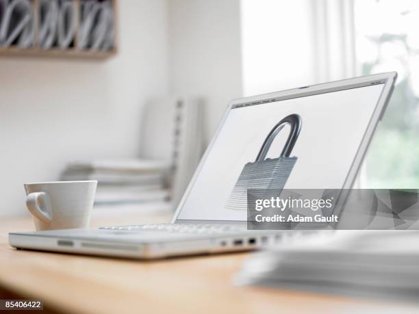 padlock picture on laptop screen - padlock stock pictures, royalty-free photos & images