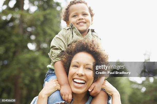 7,753 Shoulder Rides Mom Stock Photos, High-Res Pictures, and Images ...