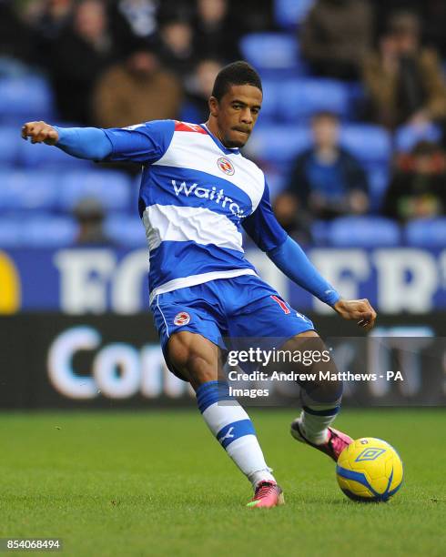 Reading's Garath McCleary scores his side's fourth goal during the FA Cup Fourth Round match at the Madejski Stadium, Reading.