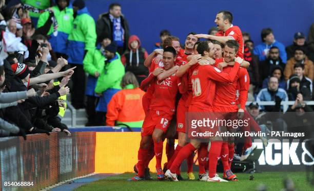 From Dean Bowditch to Ryan Harley** MK Dons' Ryan Harley celebrates scoring the third goal during the FA Cup Fourth Round match at Loftus Road,...