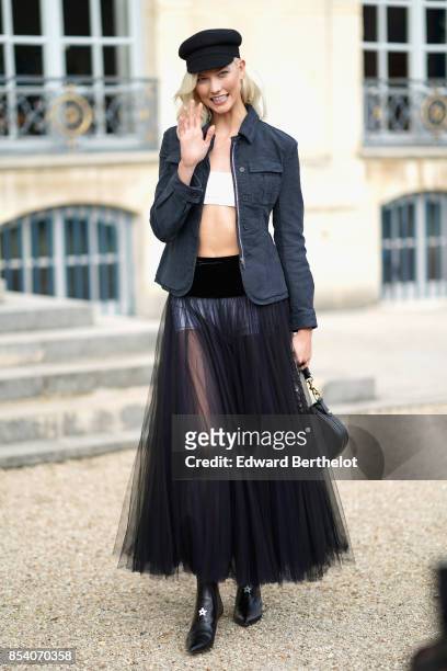 Karlie Kloss attends the Christian Dior show as part of the Paris Fashion Week Womenswear Spring/Summer 2018 on September 26, 2017 in Paris, France.
