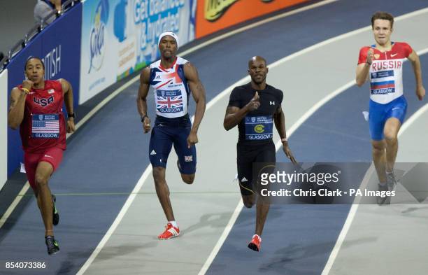 Kind Butler of USA Conrad Williams of Great Britain and Kim Collins of Saint Kitts and Nevis run the 200 metres during the Aviva International Match...