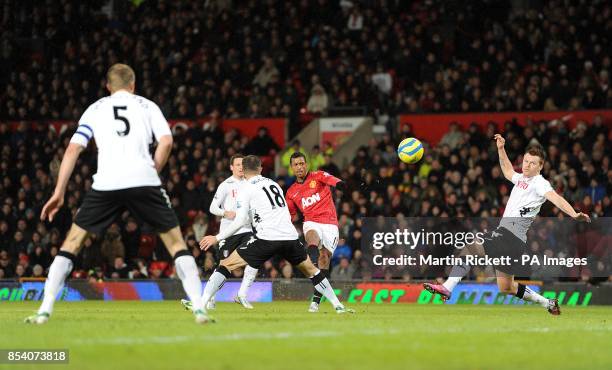 Manchester United's Luis Nani attempts to curle a shot as he is closed down by the Fulham defence