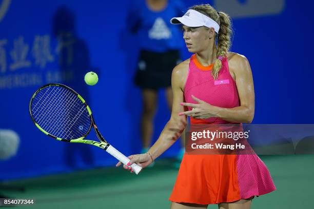 Caroline Wozniacki of Denmark reacts during the match against Maria Sakkari of Greece on Day 3 of 2017 Dongfeng Motor Wuhan Open at Optics Valley...